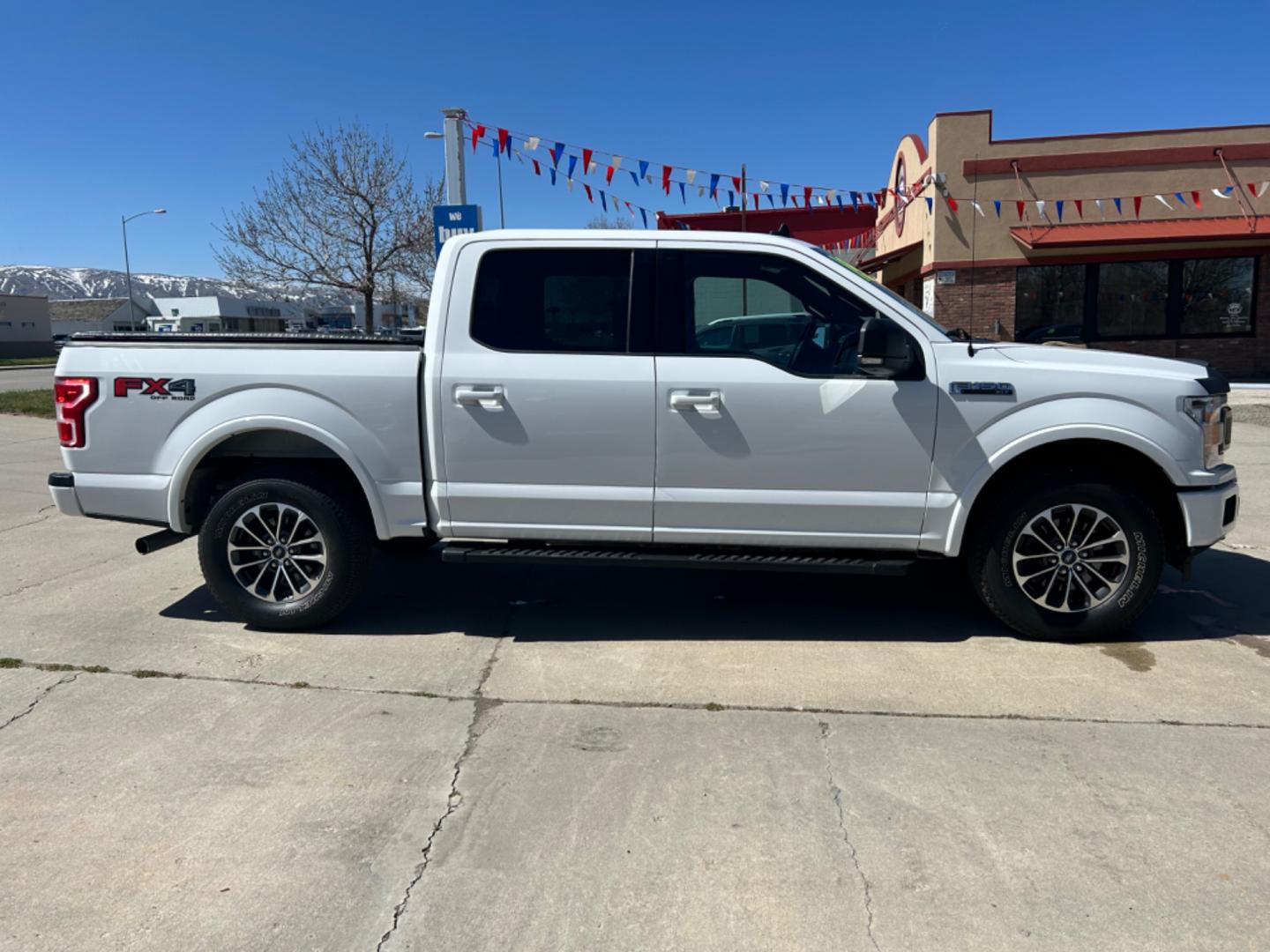 2019 WHITE Ford F-150 XLT FX4 (1FTEW1E47KF) with an V6, 3.5L engine, Automatic transmission, located at 3030 CY Ave, Casper, WY, 82604, (307) 265-3830, 42.827816, -106.357483 - Looking for a reliable, powerful truck that can tackle any job or adventure? Look no further than this stunning pre-owned 2019 Ford F-150 XLT !<br><br>This robust beast is equipped with a V6, 3.5L engine, delivering impressive power and performance for both work and play. Whether you're hauling heav - Photo#4